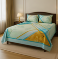 Bed with decorative quilt and pillows in a bedroom setting